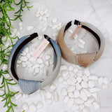 Diadema con pliegues brillantes