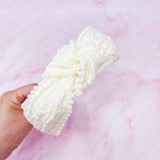 Bandeau élégant orné de perles et nœud
