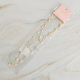 Collier à longue chaîne en forme de cœur et de perles