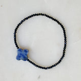 Bracelet extensible semi-précieux avec croix arrondie