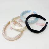 Diadema trenzada de seda satinada