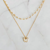 Collar de mariposa con cadena de perlas en capas