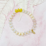 Bracelet extensible à boules semi-précieuses