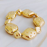 Bracelet extensible avec galets dorés Starlight