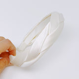 Diadema trenzada de seda satinada