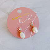 Boucles d'oreilles pendantes élégantes en perles d'eau douce
