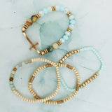 Juego de 4 pulseras de cuentas de piedra y madera.