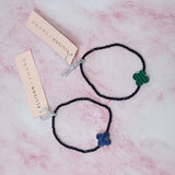 Bracelet extensible semi-précieux avec croix arrondie