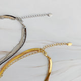 Collar de cadena y corazón perfectamente superpuesto