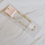 Precioso collar de cadena con perlas y minicorazones