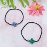 Bracelet extensible semi-précieux avec croix arrondie