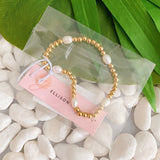 Pulseras de adorno dorado con perlas de agua dulce