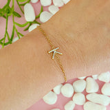 Pulsera con inicial brillante y delicada