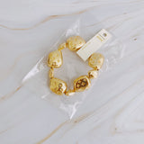 Bracelet extensible avec galets dorés Starlight
