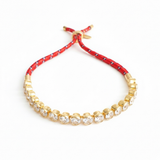 Adjustable rope-style tennis bracelet featuring round bezel-set cubic zirconia stones, offering a modern blend of shimmer and sporty sophistication.