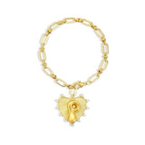 Gold chain bracelet with a heart-shaped charm and initial letter P over the heart charm on a white background