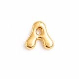 Glossy, balloon-style metal initial brooch pins in a playful, rounded design, available in multiple letters with a puffy, dimensional shape and metallic finish.