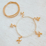 Fun set of three stretch bracelets featuring playful balloon puppy charms—perfect for adding a whimsical and cheerful touch to any outfit.