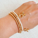 Fun set of three stretch bracelets featuring playful balloon puppy charms—perfect for adding a whimsical and cheerful touch to any outfit.