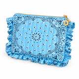 a bandana print ruffled and quilted pouch in blue on white background