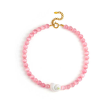 Pink beaded necklace with a gold clasp on a white background