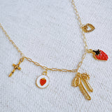 Gold charm bracelet with strawberry, heart and bow – romantic playful bracelet