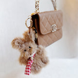 Cute bag charm featuring a fluffy rabbit design with a brushable texture, perfect for adding a playful and whimsical touch to your bag.