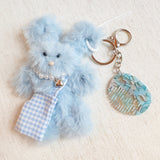 Cute bag charm featuring a fluffy rabbit design with a brushable texture, perfect for adding a playful and whimsical touch to your bag.