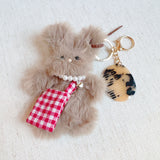 Cute bag charm featuring a fluffy rabbit design with a brushable texture, perfect for adding a playful and whimsical touch to your bag.