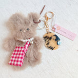 Cute bag charm featuring a fluffy rabbit design with a brushable texture, perfect for adding a playful and whimsical touch to your bag.