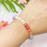 Bracelet extensible à boules semi-précieuses