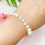 Bracelet extensible à boules semi-précieuses