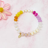 Bracelet extensible à boules semi-précieuses