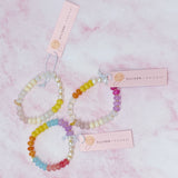 Bracelet extensible à boules semi-précieuses