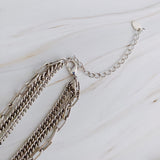 Collier superposé de perles de résine et cœur doré