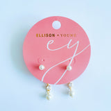 Elegant gold drop earrings featuring two luminous pearls in a contemporary linear design. The Celeste Double Pearl Earrings combine timeless sophistication with a modern gold finish, perfect for both casual and formal wear.