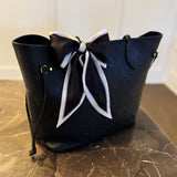 Elegant ribbon-style scarf with contrasting edges, perfect for adding a refined touch to hairstyles, handbag handles, or necklines.