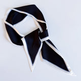 Elegant ribbon-style scarf with contrasting edges, perfect for adding a refined touch to hairstyles, handbag handles, or necklines.