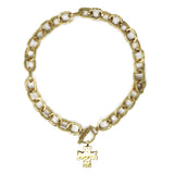 Gold chain bracelet with a cross charm on a white background