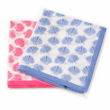 Two beach towels with shell patterns, one pink and one blue, on a white background.