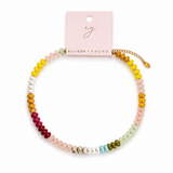 colorful beads in a necklace with gold tone hardware