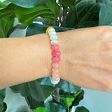 Vibrant beaded stretch bracelet featuring colorful glass beads with a playful mix of tones and textures. The Color Garden Stone Beaded Stretch Bracelet adds a cheerful touch to any outfit with its bright hues and comfortable elastic fit.