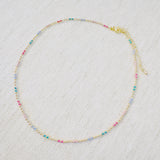 Delicate ball chain necklace featuring multicolor beads for a playful, vibrant look—perfect for layering or wearing solo to brighten up any outfit.