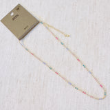 Delicate ball chain necklace featuring multicolor beads for a playful, vibrant look—perfect for layering or wearing solo to brighten up any outfit.
