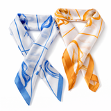 Two scarves, one blue and white patterned and the other orange and white patterned, on a white background.