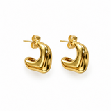 Pair of 18K gold-plated Ellison+Young Cove Hoop Earrings with an abstract, sculptural square-ish silhouette, shown on a white background