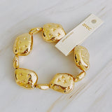 Bracelet extensible avec galets dorés Starlight