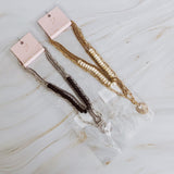 Collier superposé de perles de résine et cœur doré