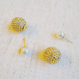 Shiny gold tone disco ball earrings with an elegant pearl back detail, adding a fun yet classy twist to your party look.