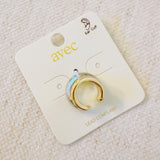 Stylish ear cuff featuring a dual-tone design with gold and silver finishes—offering a bold, modern look without the need for a piercing.